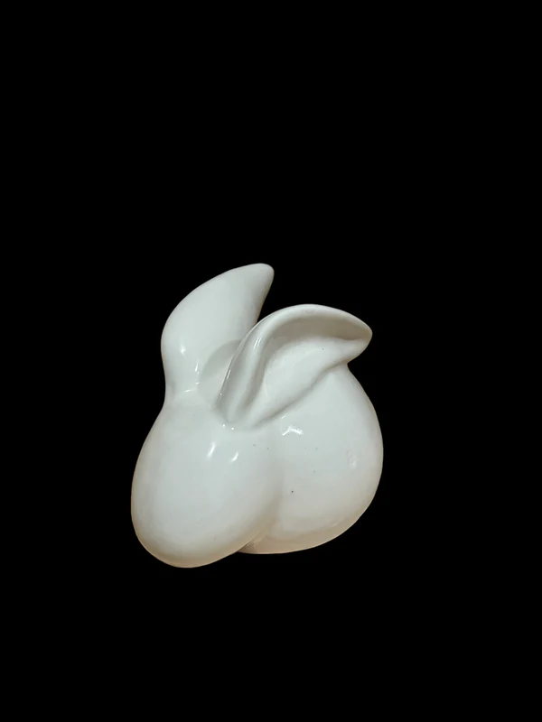 The Hareball Baby Bunny ceramic piece is shown. It is a small white bunny with only a body, head, and ears.